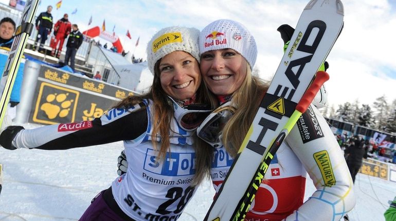 Lindsey Vonn, right, celebrates with Julia Mancuso after winning an...