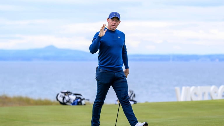 Rory McIlroy on the 12th hole on day one of...