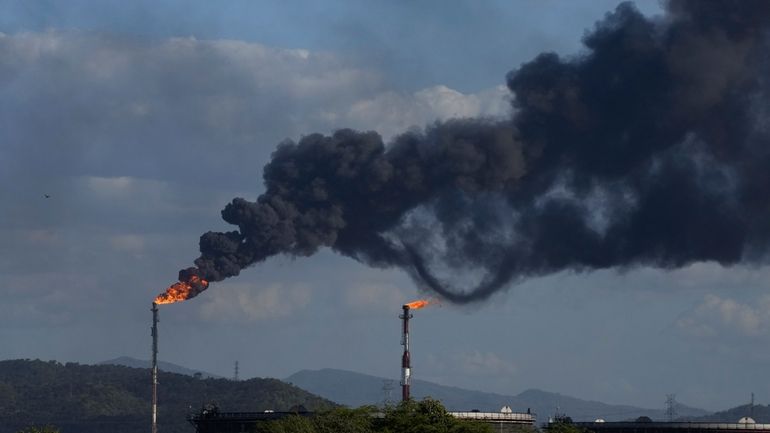 Gas is flared at the Jose Antonio Anzoategui oil complex...