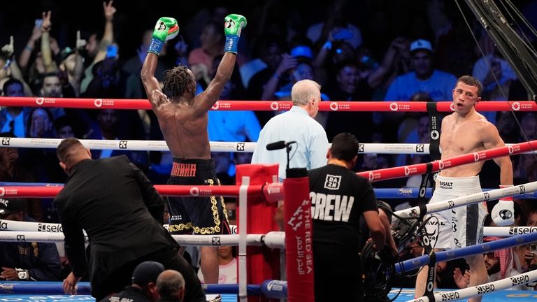 Terence Crawford, left, reacts at the end of the fight...