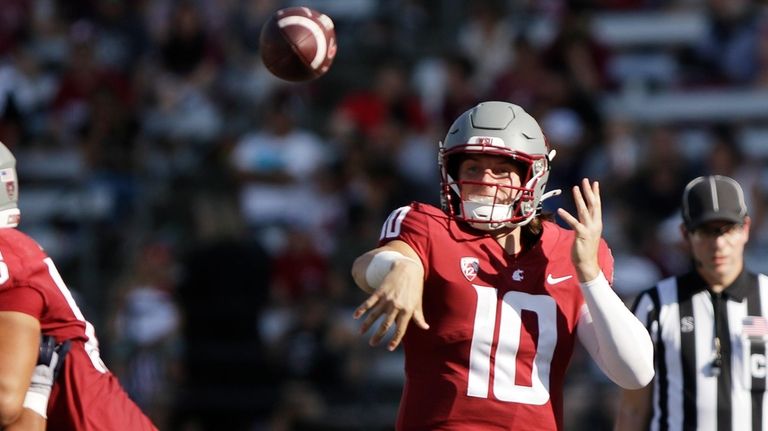 Washington State quarterback John Mateer throws a pass during the...