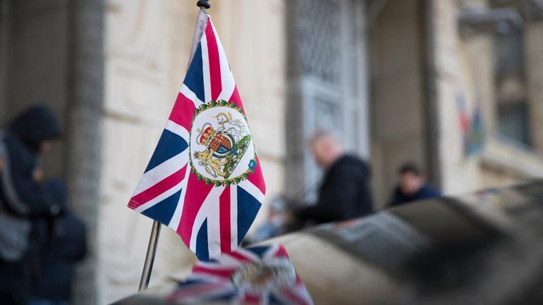 The British Union flag flies from the front of British...