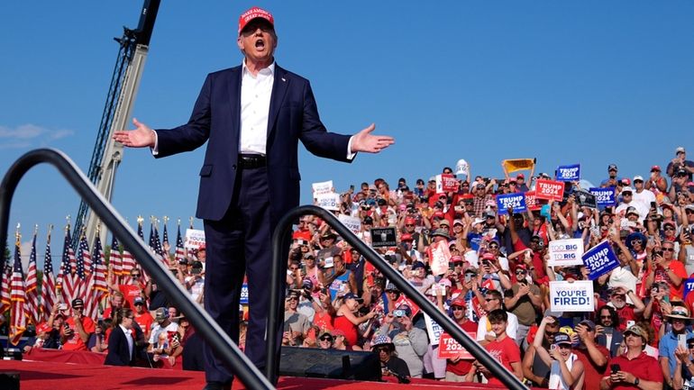 Republican presidential candidate former President Donald Trump arrives for a...