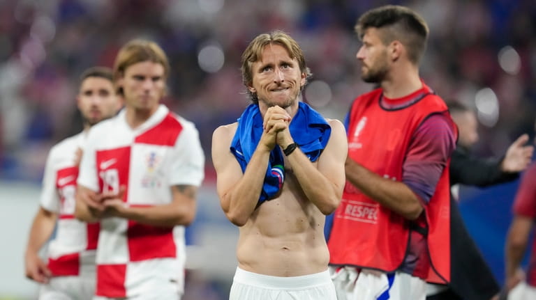 Croatia's Luka Modric reacts at the end of Group B...