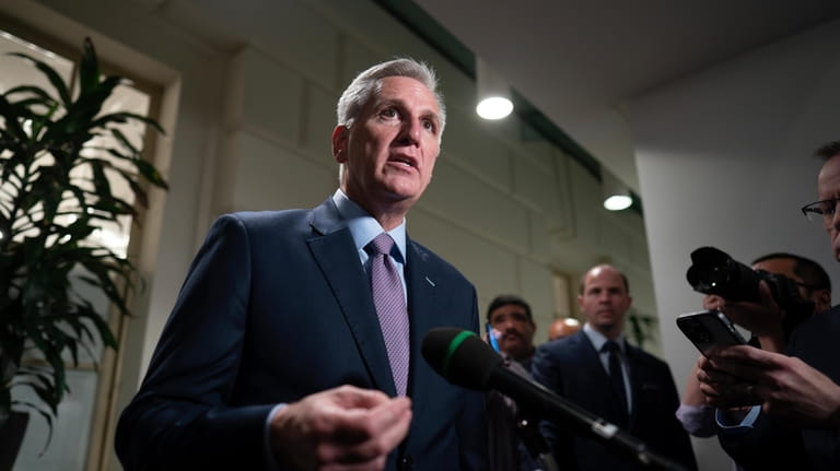 Speaker of the House Kevin McCarthy, R-Calif., talks to reporters...