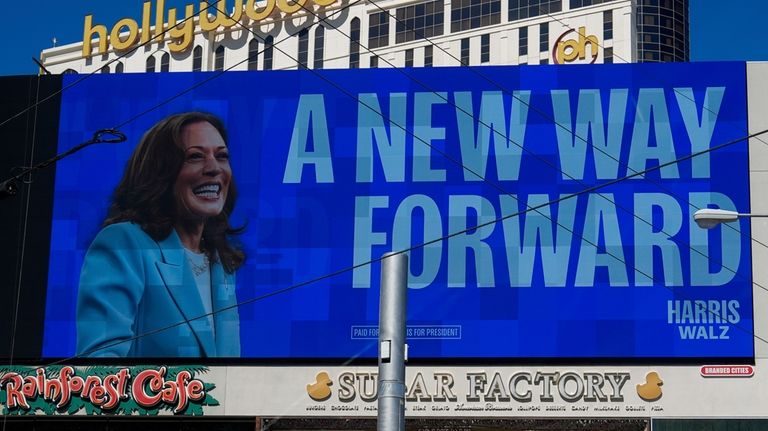 A billboard displays an advertisement for Democratic presidential nominee Vice...