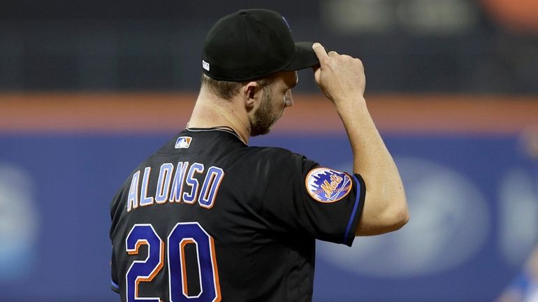 Pete Alonso of the New York Mets reacts after Patrick...