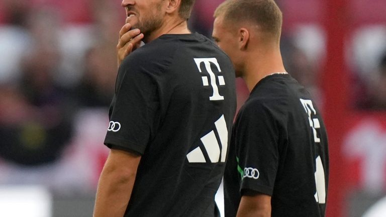 Bayern's Harry Kane grimaces prior the German Super Cup final...