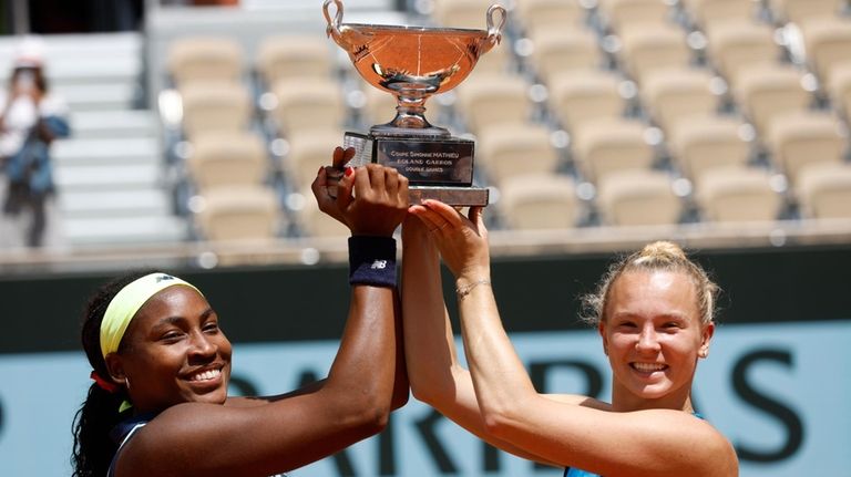 Coco Gauff of the U.S., left, and Katerina Siniakova of...