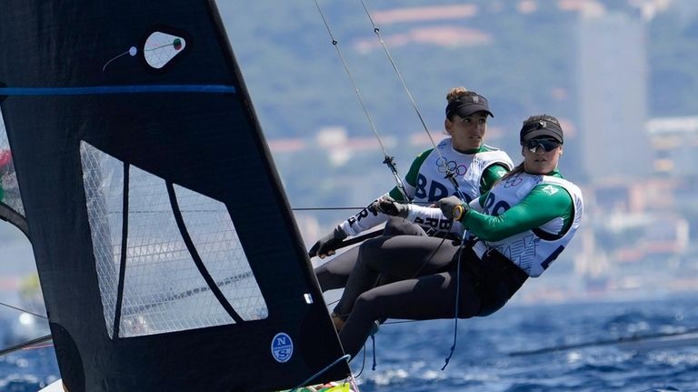 FILE -Martine Grael, left, and Kahena Kunze of Brazil compete...