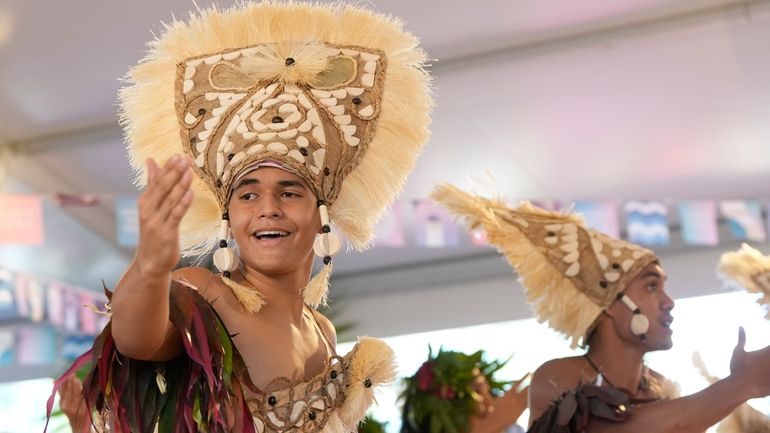 Dancers perform during an opening ceremony for the 2024 Summer...