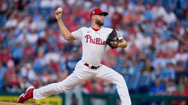 Philadelphia Phillies' Zack Wheeler throws during the first inning of...