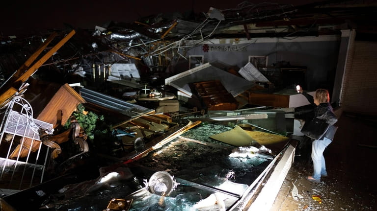 A business destroyed by a tornado on West Main in...