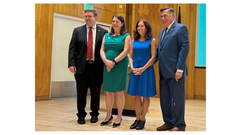 Suffolk County executive candidates Democrat Dave Calone, far left, and...