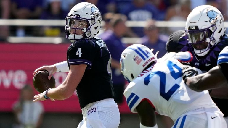 TCU quarterback Chandler Morris (4) looks to pass as SMU...