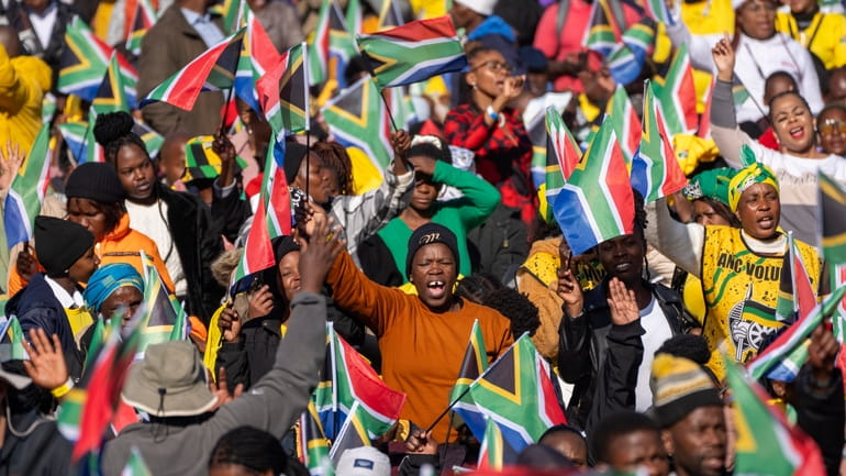 South Africans gather ahead of the inauguration of South Africa's...