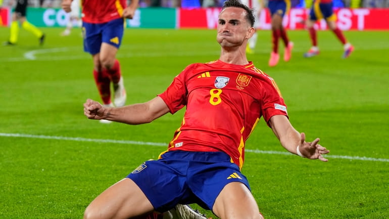 Spain's Fabian Ruiz celebrates after scoring his sides second goal...