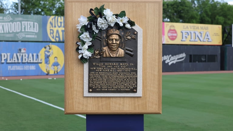A plaque honoring Willie Mays is seen before the start...