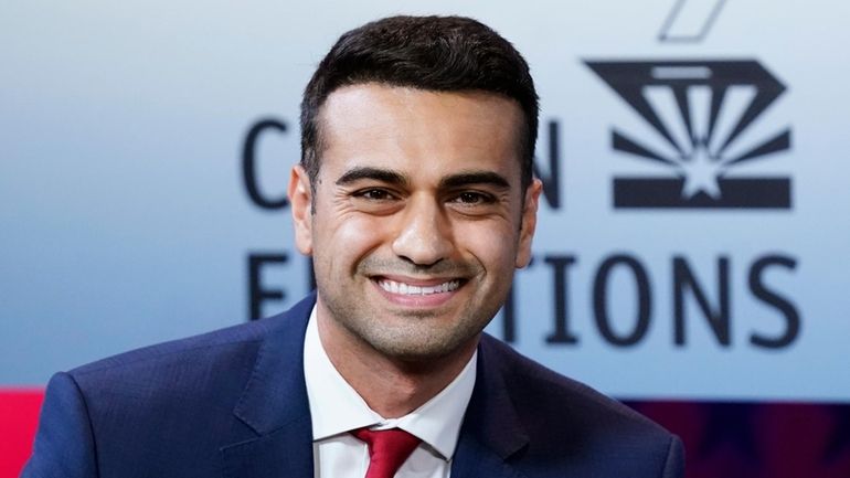 Then-Republican candidate for Arizona Attorney General, Abraham Hamadeh, smiles prior...