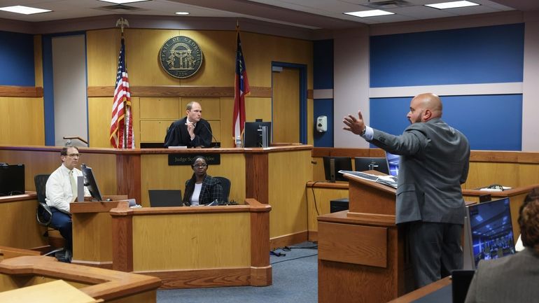 Attorney Scott Grubman, who is defending Kenneth Chesebro, argues before...