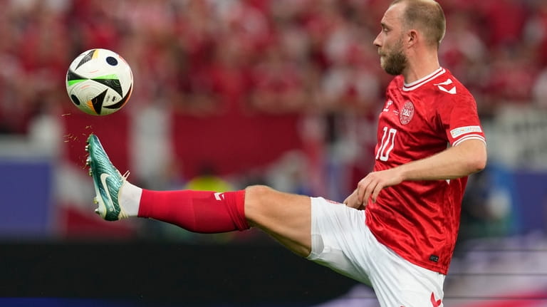 Denmark's Christian Eriksen controls the ball during a Group C...