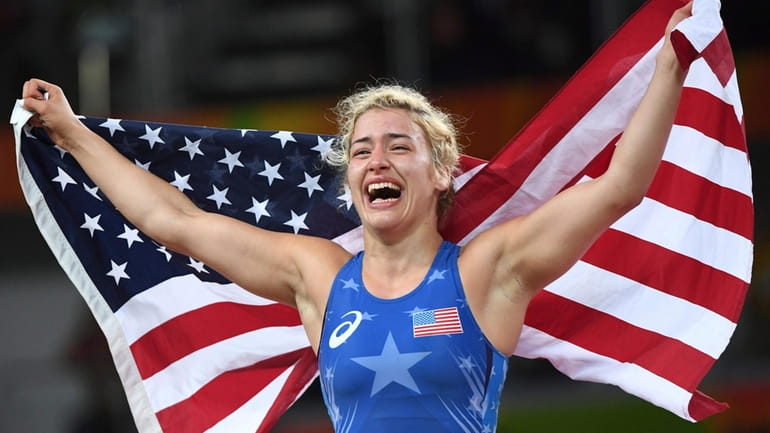 United States' Helen Louise Maroulis celebrates after beating Japan's Saori...