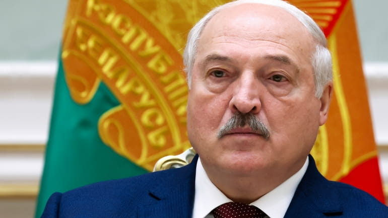 Belarusian President Alexander Lukashenko attends a joint statement with Russian...