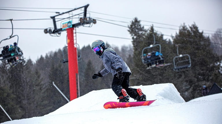 Snowboarding is one of the ways to tackle the slopes...
