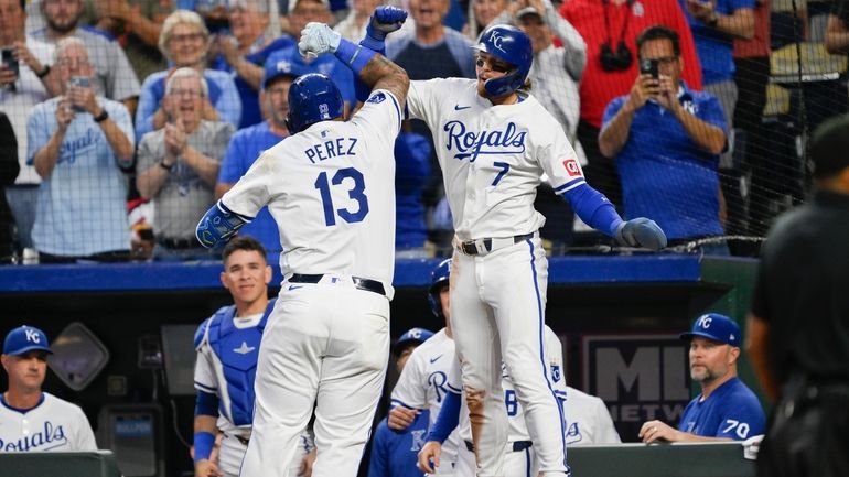 Kansas City Royals' Salvador Perez celebrates his two-run home run...