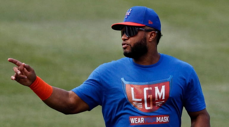 Robinson Cano #24 of the Mets works out on the field...