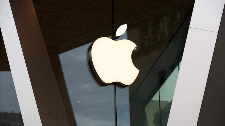 An Apple logo adorns the facade of the downtown Brooklyn...