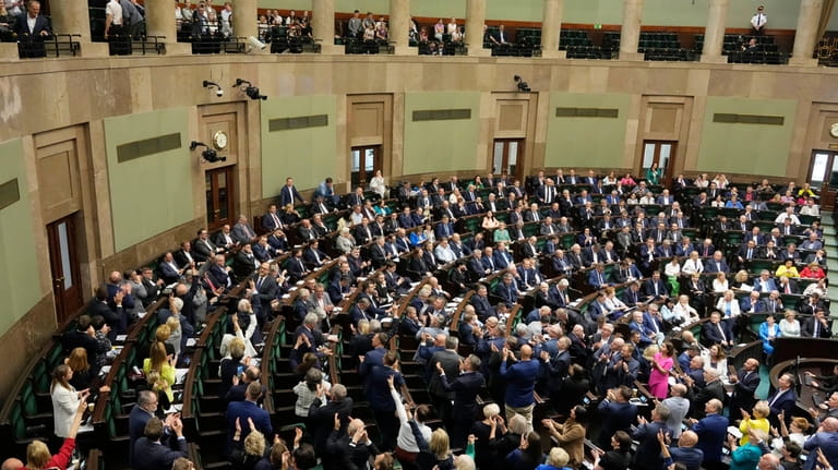 Poland's lawmakers vote in parliament, in Warsaw, Poland, Friday, May...