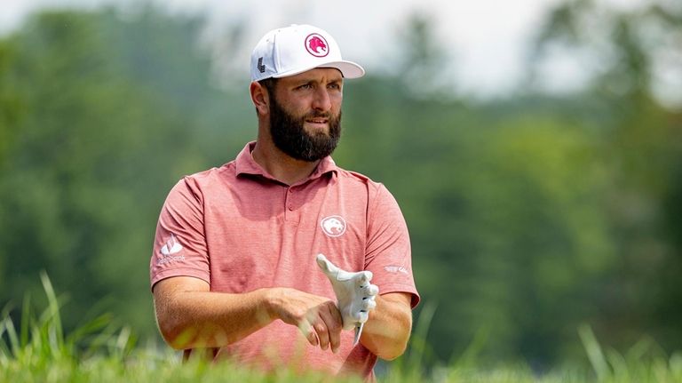 Captain Jon Rahm, of Legion XIII, waits on the 11th...