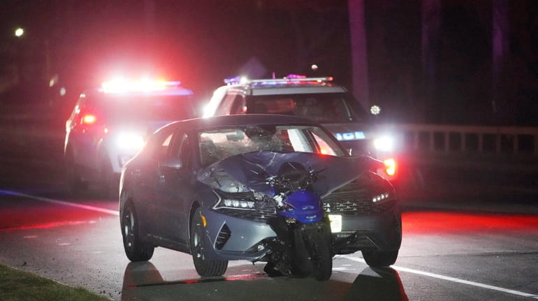 Nassau County police investigate a fatal crash in which a...