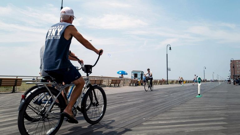 Bike along the boardwalk at Long Beach for a picturesque...