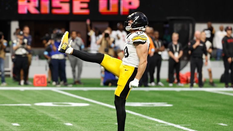 Pittsburgh Steelers linebacker T.J. Watt celebrates after sacking Atlanta Falcons...