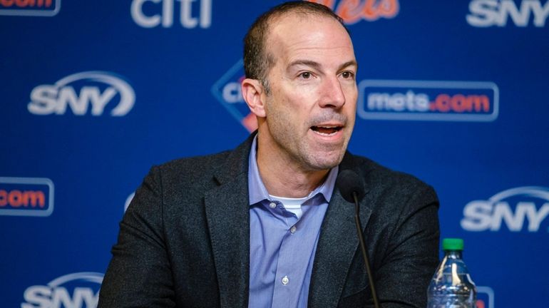 Mets general manager Billy Eppler speaks during a news conference...