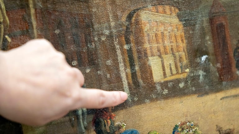 A painting saved from Boersen during the fire is shown...