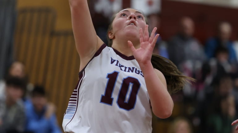 Emma Priolo of North Shore drives for an uncontested layup during...