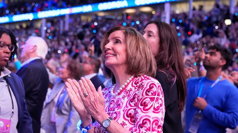 Rep. Nancy Pelosi, D-Calif., watches during the Democratic National Convention...