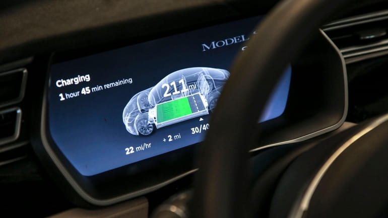 A Tesla Model S electric car charging.