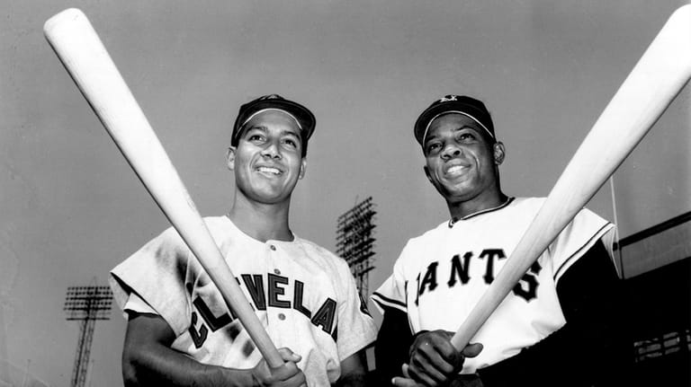 Batting champions Bobby Avila, left, of the Cleveland Indians, and...