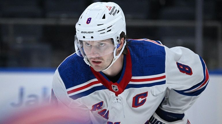 Rangers defenseman Jacob Trouba sets before a face-off against the Islanders...