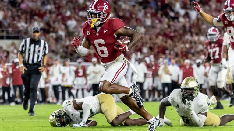 Alabama wide receiver Kobe Prentice (6) scores a touchdown on...