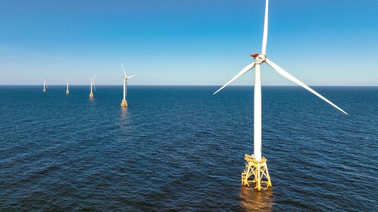 Wind turbines generate electricity at the Block Island Wind Farm...