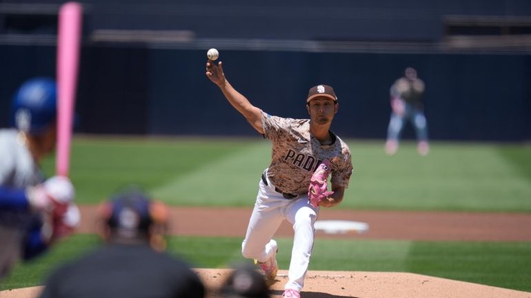 San Diego Padres starting pitcher Yu Darvish works against a...