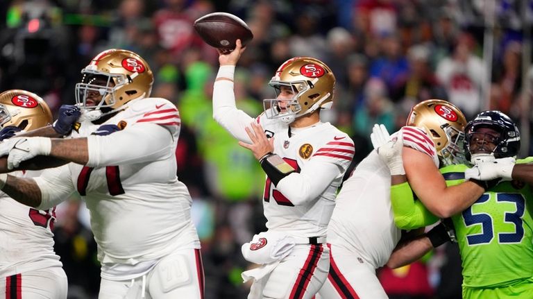 San Francisco 49ers quarterback Brock Purdy throws during the second...