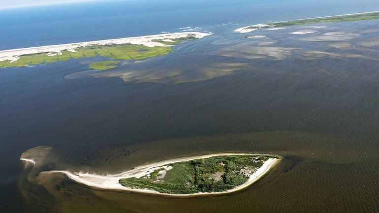 A picture of the breech in Bellport Bay shows the...