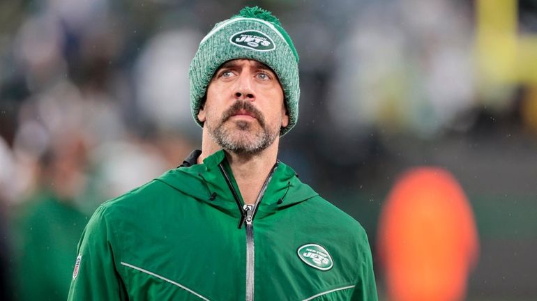 Jets quarterback Aaron Rodgers looks on during the second half against...