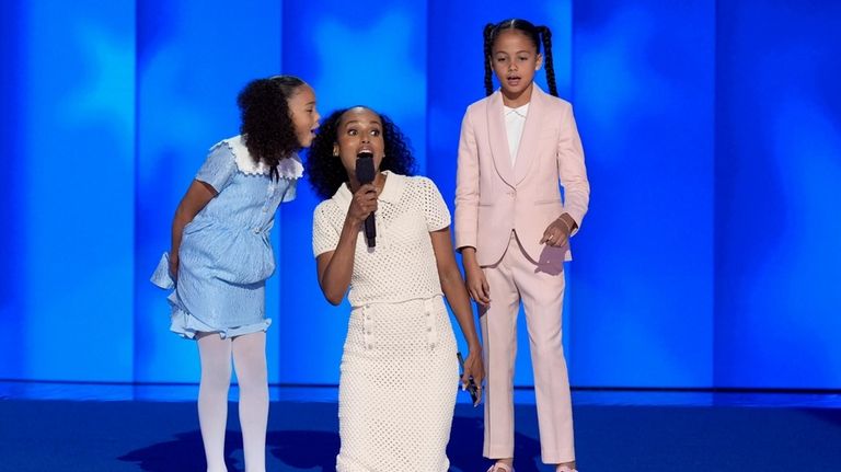 Kerry Washington, center, with grand-nieces of Vice President Kamala Harris...